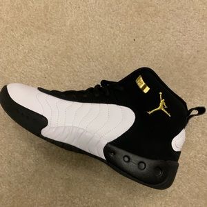 Black, white, and gold Jordan Jumpman Pros